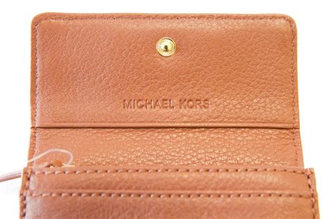 portfel michael kors oryginal i podrobka|How to recognize an authentic Michael Kors wallet. How to spot a .